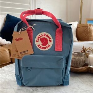 Fjällräven Kånken teal mini backpack with pink straps